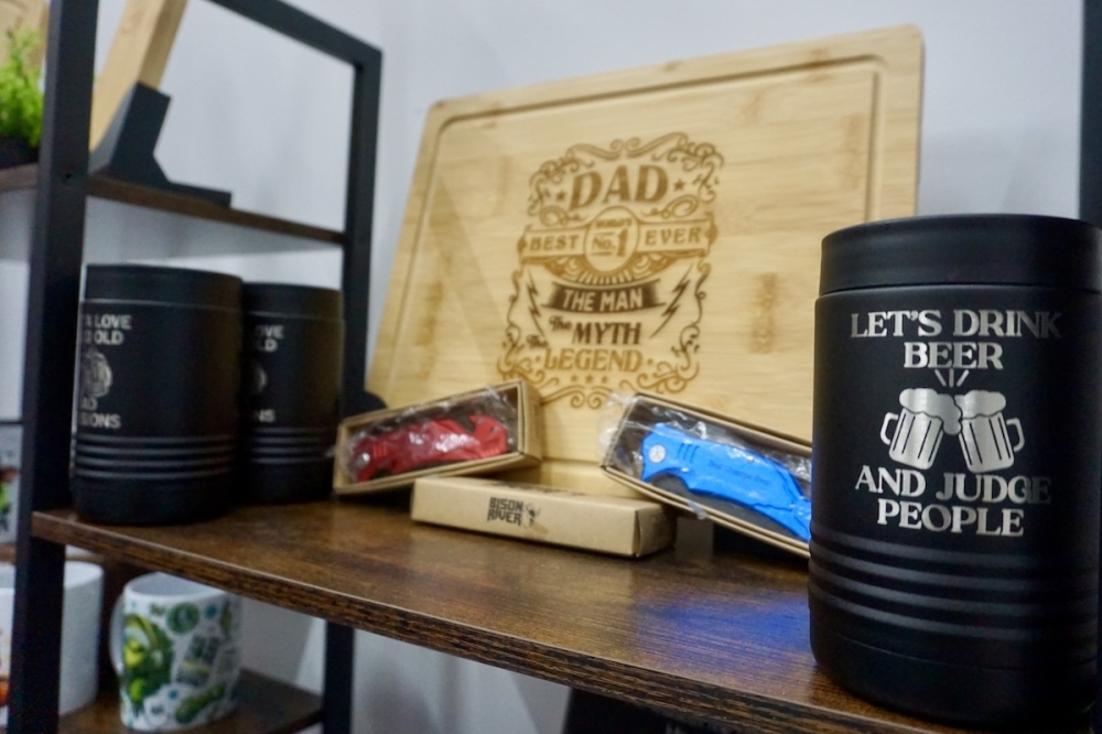 Triple Elevation Custom Creations offers printed shirts, laser engraving and 3D printing services. (Sierra Martin/Community Impact)